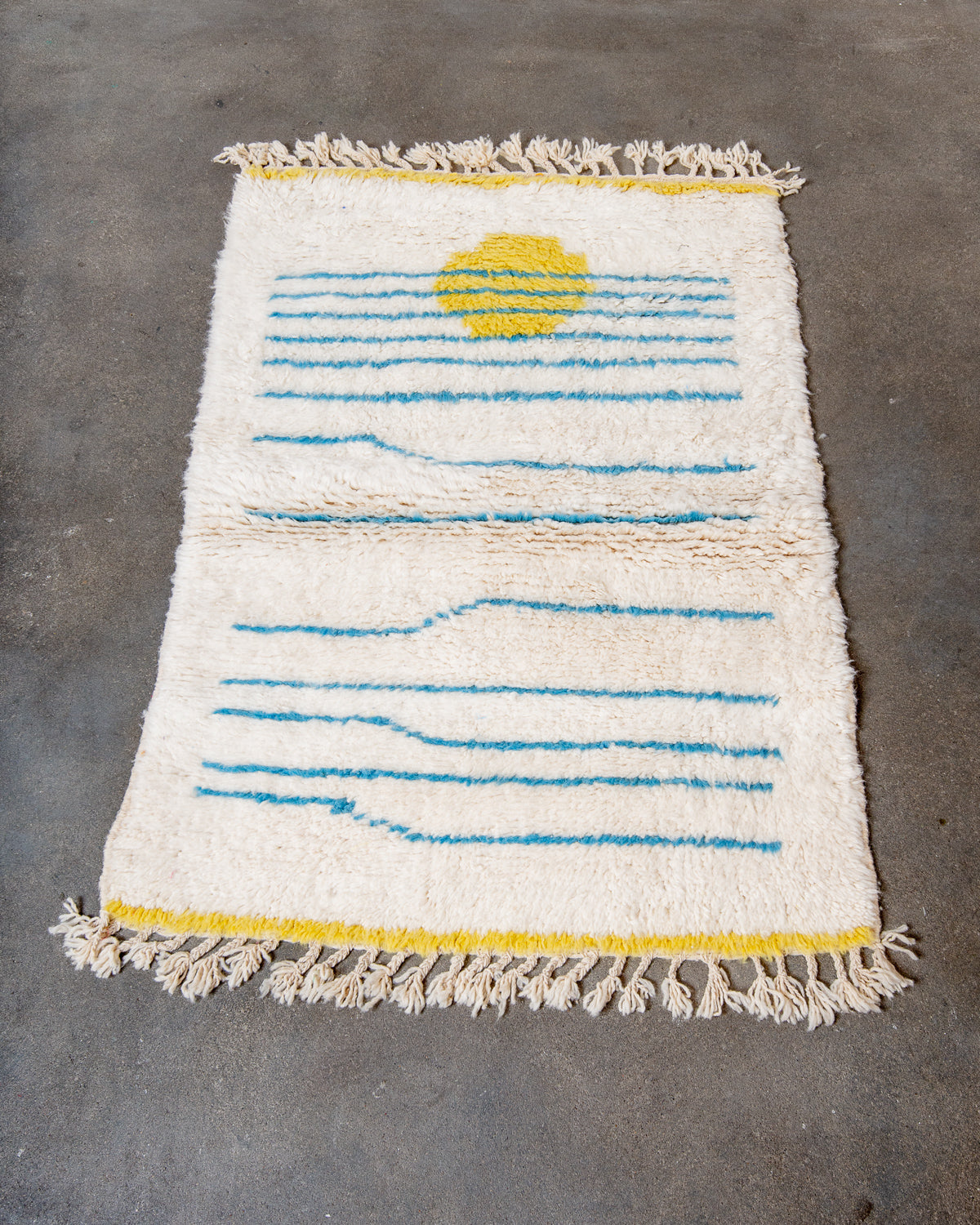 Modern, designer, handcrafted Berber rug from Morocco. Beniourain carpet with beautiful colours and patterns and fluffy wool texture.